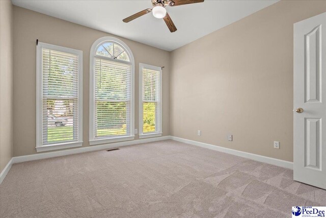 3401 Sussex Ct, Florence, SC 29501 - carpeted empty room with ceiling fan and baseboards