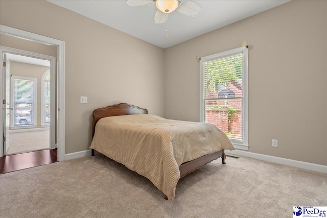 3401 Sussex Ct, Florence, SC 29501 - bedroom featuring light carpet and a ceiling fan