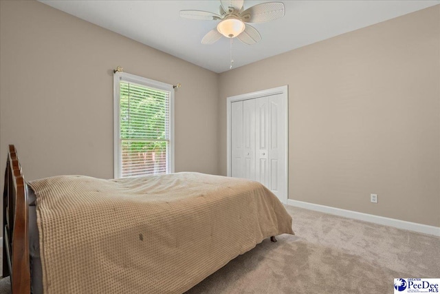 3401 Sussex Ct, Florence, SC 29501 - bedroom with light carpet, a closet, and ceiling fan