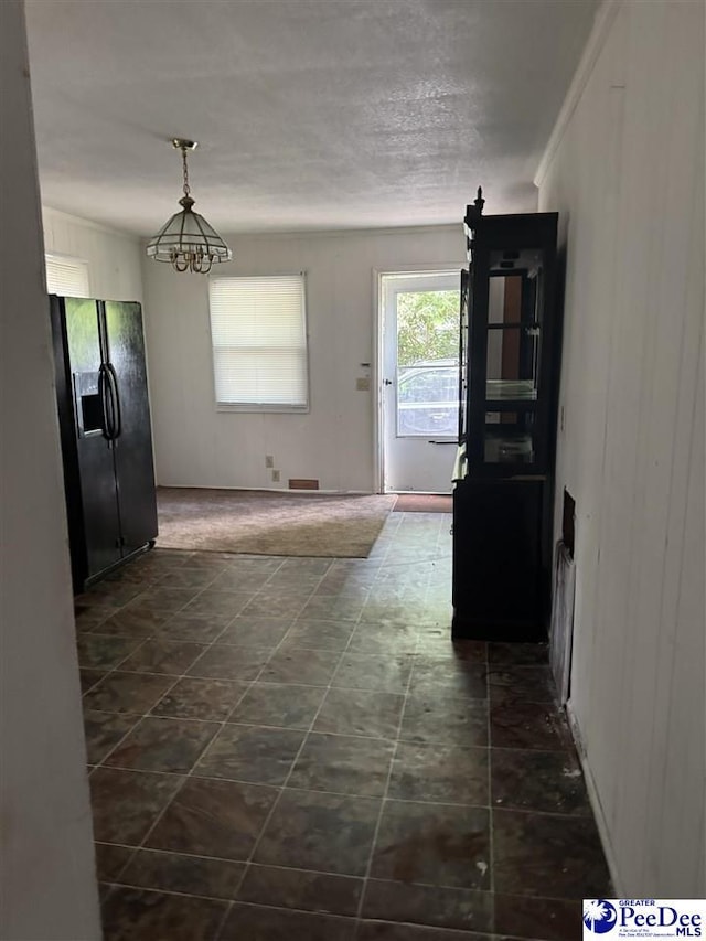 2122 Williams Gibbons Rd, Turbeville, SC 29162 - unfurnished dining area featuring a chandelier
