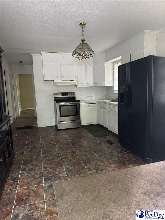 2122 Williams Gibbons Rd, Turbeville, SC 29162 - kitchen with black refrigerator with ice dispenser, stainless steel electric stove, under cabinet range hood, light countertops, and hanging light fixtures