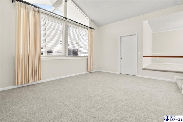 1040 Left Bank Dr, Florence, SC 29501 - unfurnished room featuring carpet, lofted ceiling, and baseboards