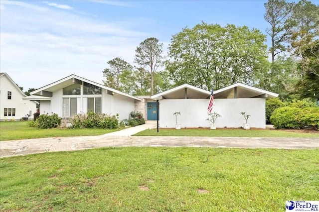 1040 Left Bank Dr, Florence, SC 29501 - mid-century modern home with a front yard