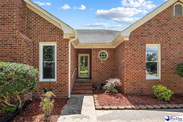 4128 W Pelican Ln, Florence, SC 29501 - property entrance featuring brick siding