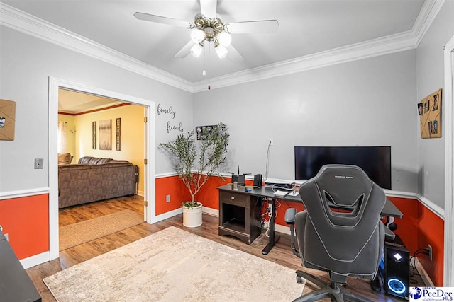 4128 W Pelican Ln, Florence, SC 29501 - office area with wood finished floors, ornamental molding, baseboards, and ceiling fan