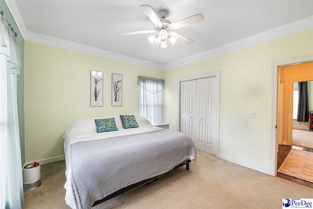 4128 W Pelican Ln, Florence, SC 29501 - bedroom featuring ornamental molding, light colored carpet, baseboards, and a closet