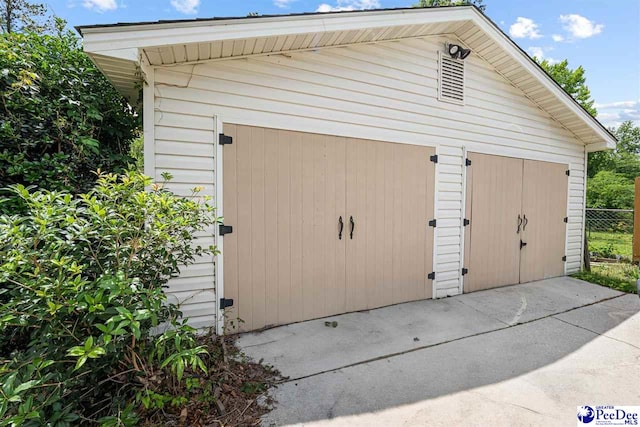 4128 W Pelican Ln, Florence, SC 29501 - detached garage featuring fence