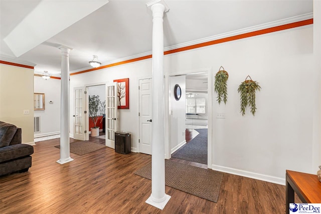 4128 W Pelican Ln, Florence, SC 29501 - workout room with ornate columns, crown molding, wood finished floors, and baseboards