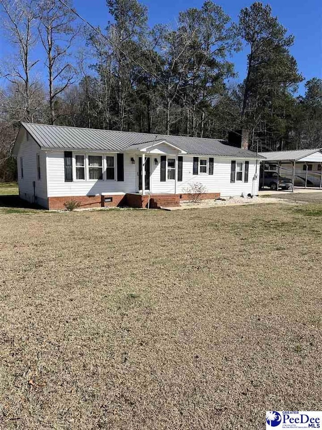 single story home with crawl space, metal roof, and a front lawn