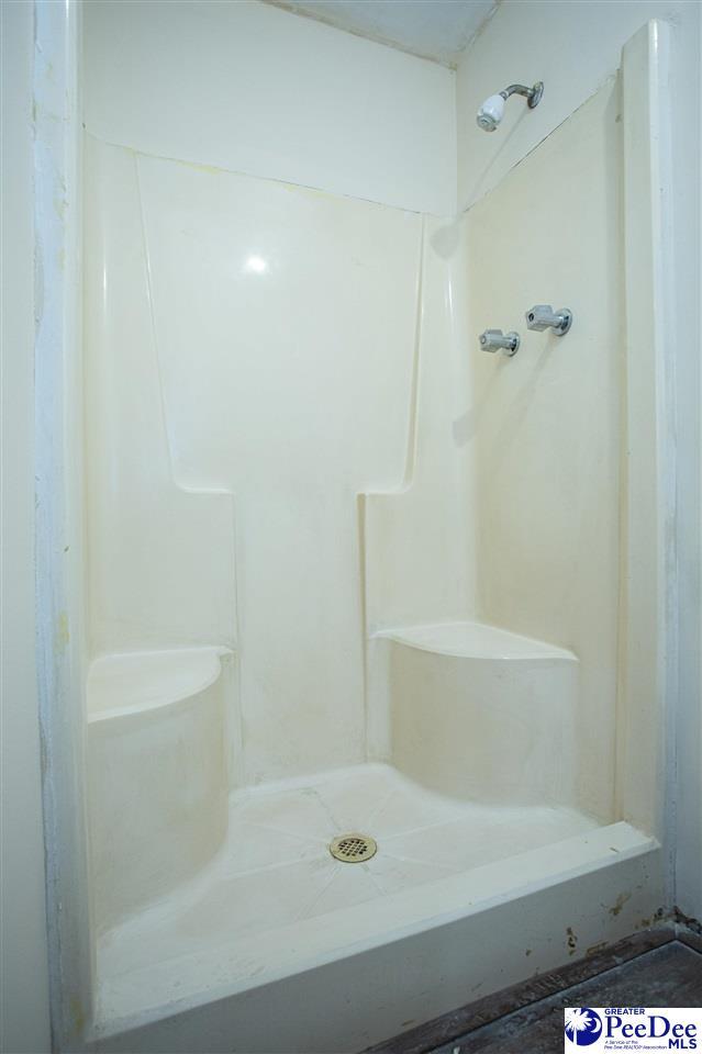 bathroom featuring a shower