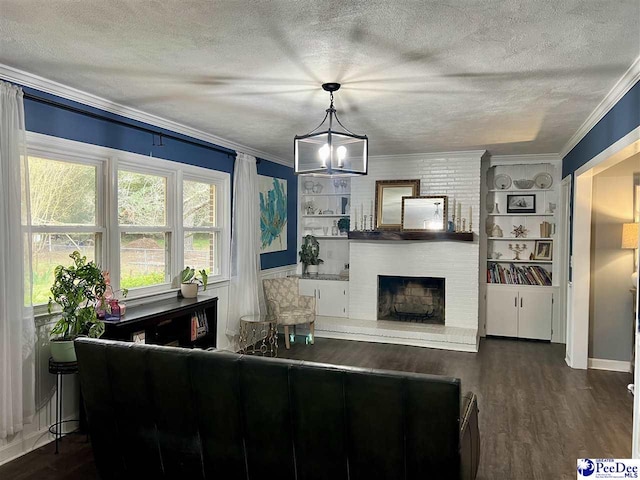 living room with a textured ceiling, crown molding, and wood finished floors