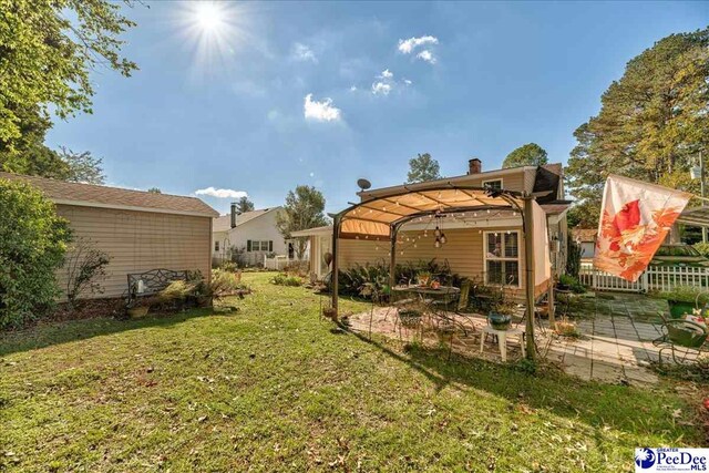 109 Tedder St, Darlington, SC 29532 - view of yard featuring a pergola and a patio area