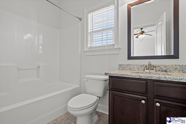 bathroom featuring toilet, vanity, and washtub / shower combination