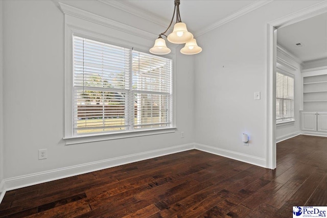 unfurnished dining area with built in shelves, dark wood-style floors, baseboards, visible vents, and ornamental molding