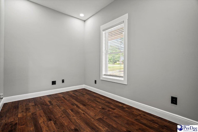 empty room featuring hardwood / wood-style floors