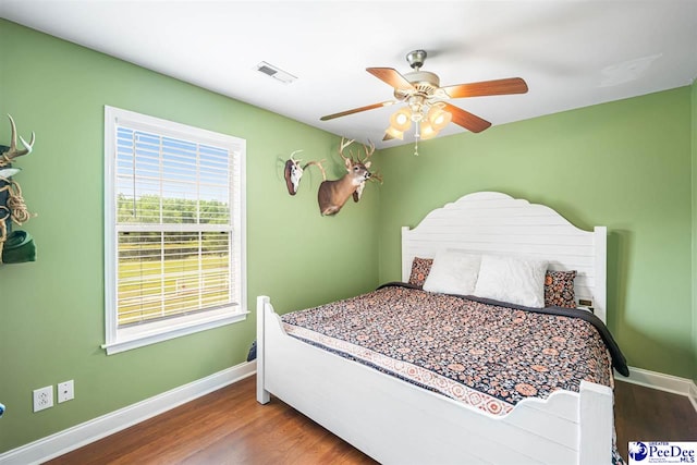 868 Moonshadow Ln, Darlington, SC 29540 - bedroom with wood finished floors and ceiling fan