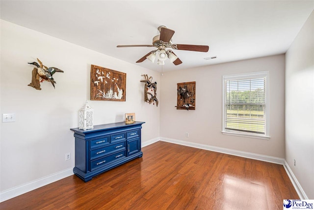 868 Moonshadow Ln, Darlington, SC 29540 - empty room featuring dark wood finished floors and ceiling fan