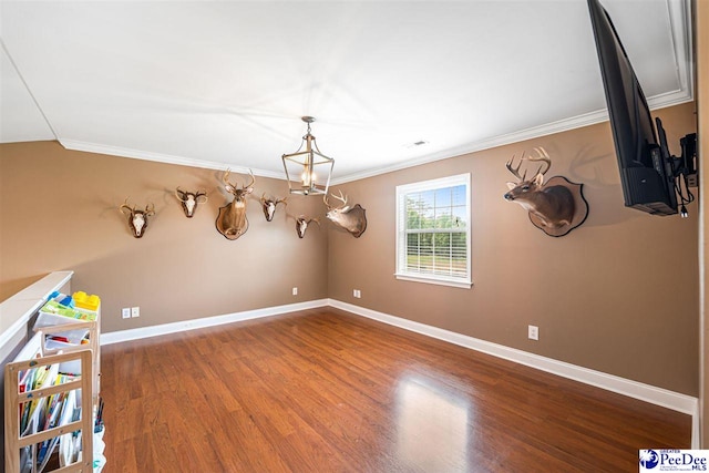 868 Moonshadow Ln, Darlington, SC 29540 - unfurnished room featuring crown molding and wood finished floors