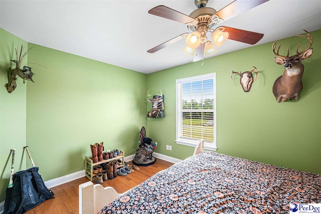 868 Moonshadow Ln, Darlington, SC 29540 - bedroom with wood finished floors and ceiling fan