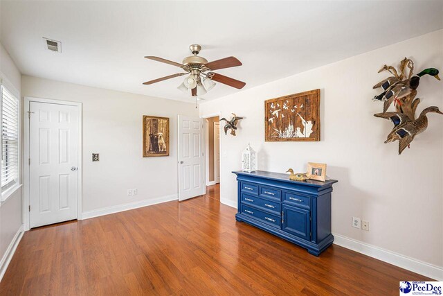 868 Moonshadow Ln, Darlington, SC 29540 - unfurnished room featuring dark wood-type flooring and a ceiling fan