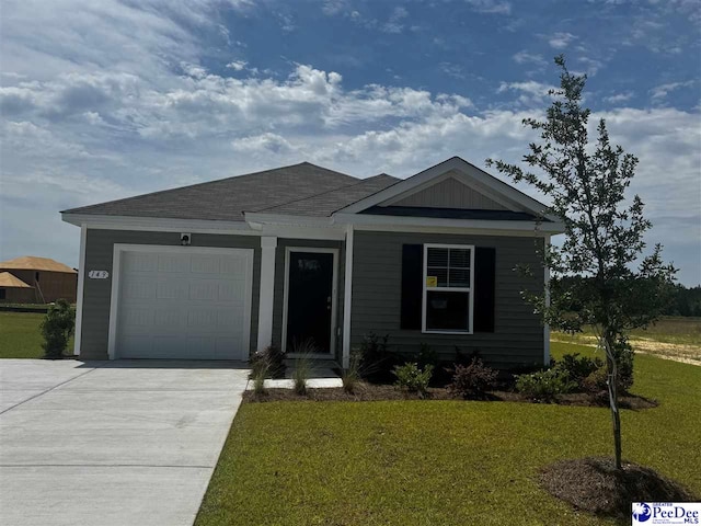 597 Strawberry Field Way, Galivants Ferry, SC 29544 - view of front facade featuring a garage, a front yard, and concrete driveway