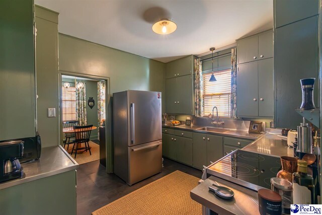 607 Third St, Cheraw, SC 29520 - kitchen with stainless steel fridge, sink, and stainless steel counters