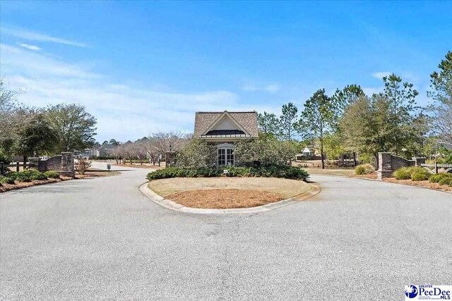 3106 Wainwright Ct, Florence, SC 29501 - view of asphalt road featuring curbs
