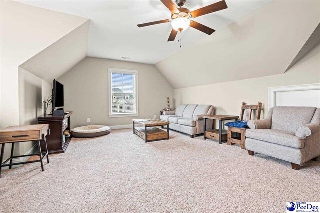 3106 Wainwright Ct, Florence, SC 29501 - living room featuring lofted ceiling, carpet, ceiling fan, and baseboards