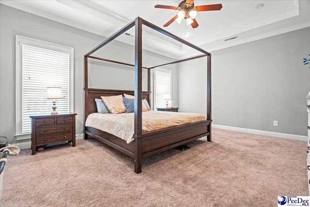 3106 Wainwright Ct, Florence, SC 29501 - bedroom with multiple windows, ornamental molding, light colored carpet, and a ceiling fan