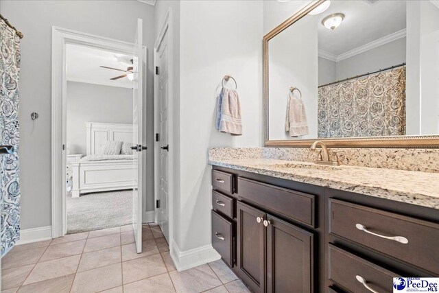 3106 Wainwright Ct, Florence, SC 29501 - full bathroom featuring crown molding, vanity, tile patterned floors, baseboards, and a ceiling fan