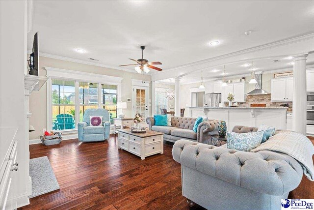 3106 Wainwright Ct, Florence, SC 29501 - living room featuring a ceiling fan, decorative columns, ornamental molding, dark wood finished floors, and recessed lighting
