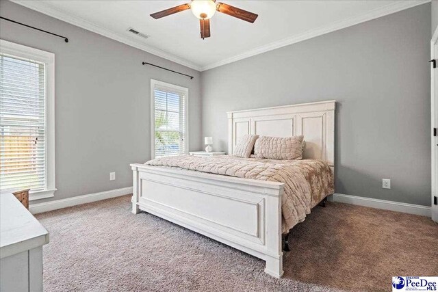 3106 Wainwright Ct, Florence, SC 29501 - bedroom featuring crown molding, baseboards, light carpet, and a ceiling fan