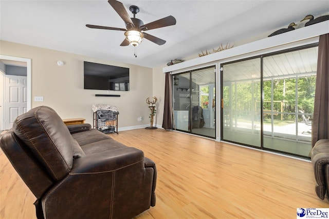 2963 Miss Annie Ct, Gresham, SC 29544 - living area with baseboards, a ceiling fan, and wood finished floors