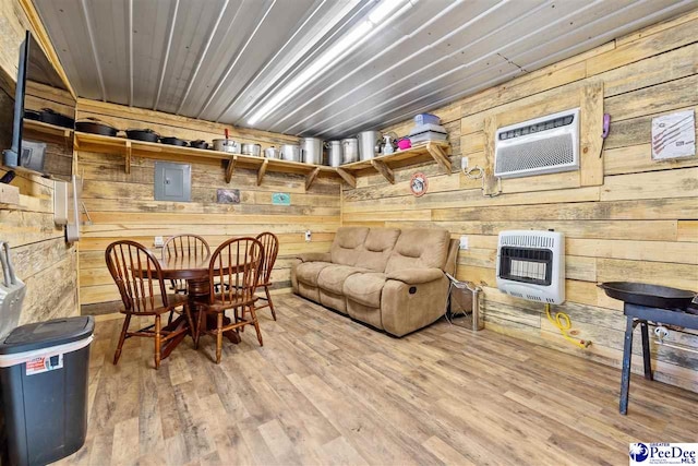 2963 Miss Annie Ct, Gresham, SC 29544 - interior space with wooden walls, heating unit, wood finished floors, and a wall mounted air conditioner