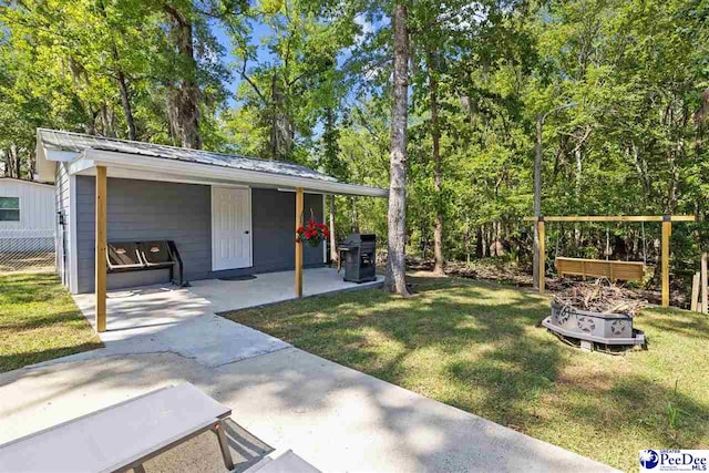 2963 Miss Annie Ct, Gresham, SC 29544 - exterior space featuring metal roof and a front lawn