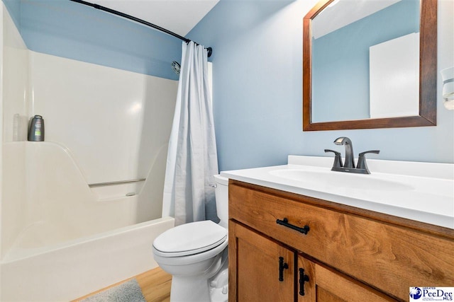 2963 Miss Annie Ct, Gresham, SC 29544 - bathroom featuring vanity, wood finished floors, shower / bath combo, and toilet