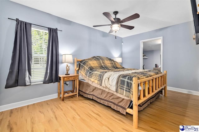 2963 Miss Annie Ct, Gresham, SC 29544 - bedroom featuring baseboards, ceiling fan, and light wood-style flooring