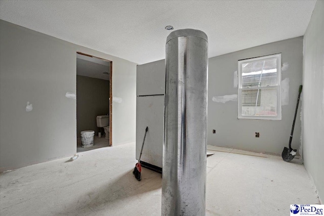 bathroom with a textured ceiling