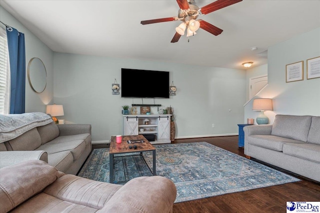 1200 Turtle Dove Dr, Effingham, SC 29541 - living room featuring a ceiling fan, wood finished floors, and baseboards