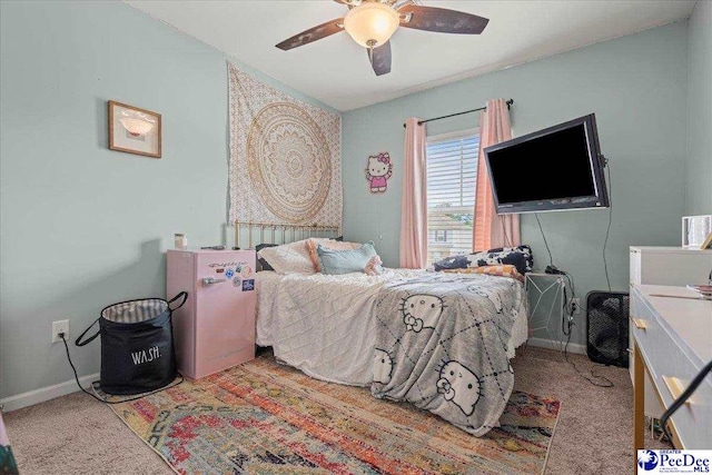 1200 Turtle Dove Dr, Effingham, SC 29541 - carpeted bedroom featuring freestanding refrigerator, baseboards, and a ceiling fan