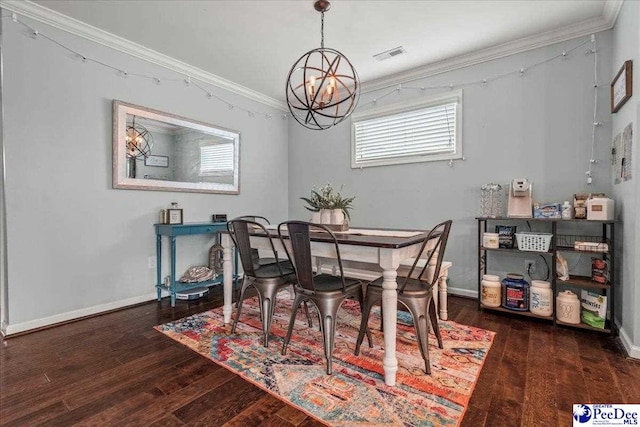 1200 Turtle Dove Dr, Effingham, SC 29541 - dining area with a chandelier, wood finished floors, crown molding, and baseboards