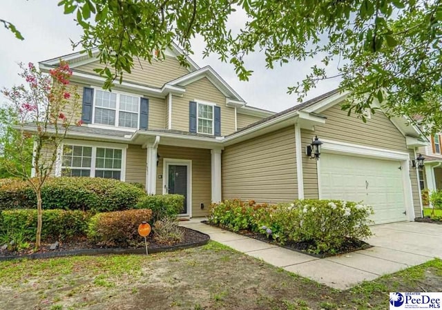 view of front of home with a garage