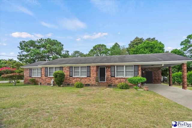 single story home featuring a front lawn and a carport