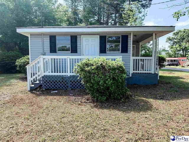 bungalow-style house featuring covered porch