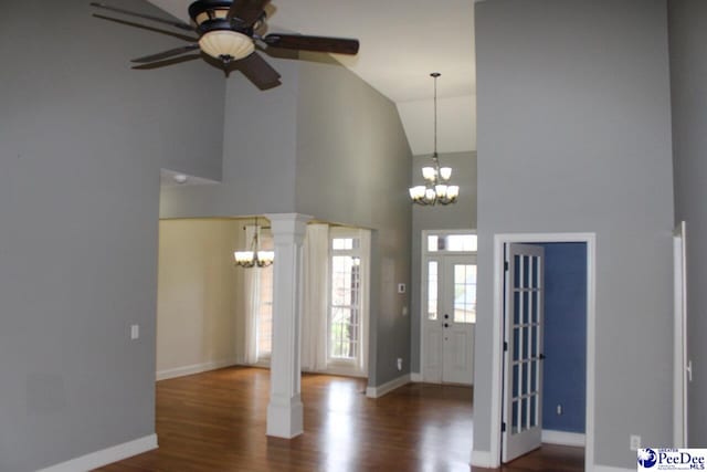 610 Garden Rose Ct, Greer, SC 29651 - foyer featuring a chandelier, high vaulted ceiling, a ceiling fan, wood finished floors, and decorative columns
