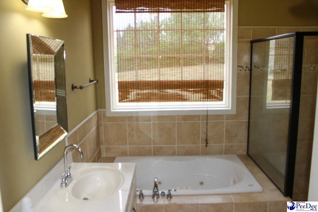 610 Garden Rose Ct, Greer, SC 29651 - full bath with a tub with jets, vanity, and a tile shower