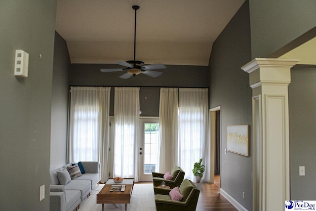 610 Garden Rose Ct, Greer, SC 29651 - living room with ceiling fan, decorative columns, vaulted ceiling, and wood finished floors