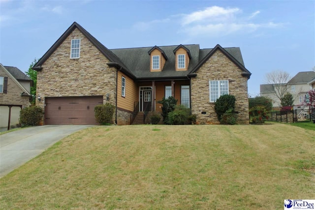 610 Garden Rose Ct, Greer, SC 29651 - craftsman house featuring stone siding, concrete driveway, and an attached garage