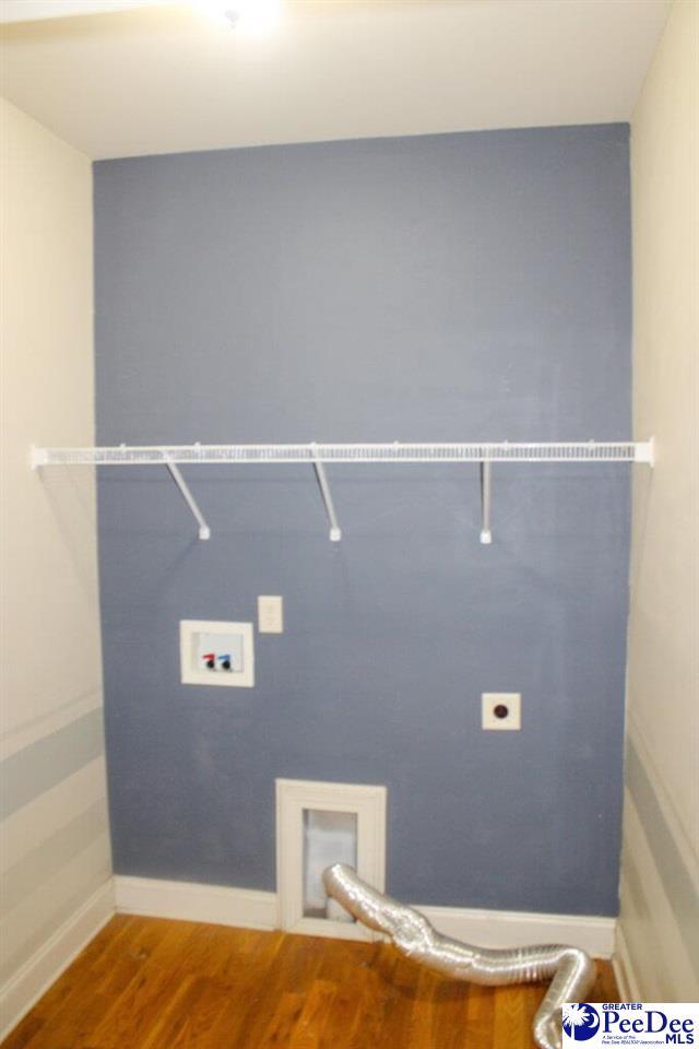 610 Garden Rose Ct, Greer, SC 29651 - laundry area with hookup for an electric dryer, washer hookup, and wood finished floors