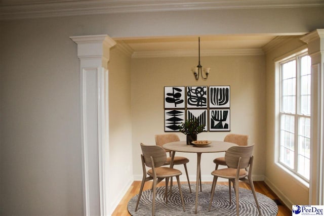 610 Garden Rose Ct, Greer, SC 29651 - dining area featuring ornate columns, wood finished floors, healthy amount of natural light, and ornamental molding